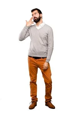 Handsome man with problems making suicide gesture Stock Photos