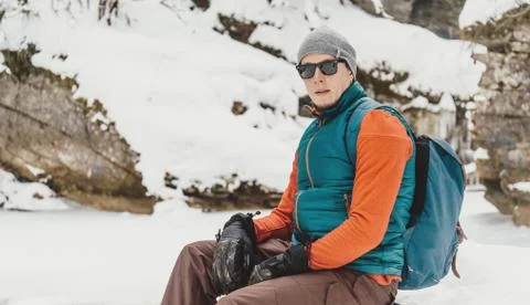 Handsome man resting in winter Stock Photos