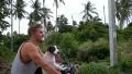 Handsome Man Riding Motorcycle with Cute Dog. HD Footage