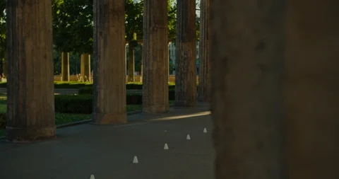 Handsome man on roller skates doing beautiful tricks and spins in city location  Stock Footage 117469867