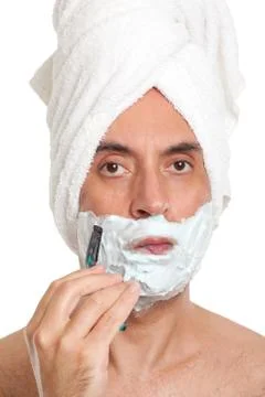 Handsome man shaving Stock Photos