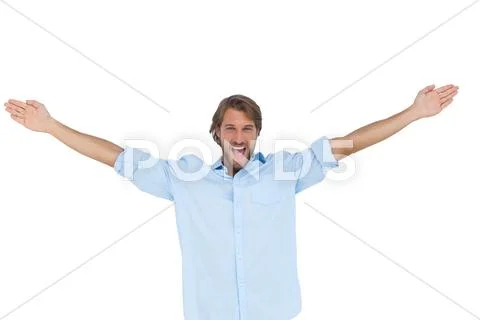 Handsome man shouting with his hands raised Stock Photos