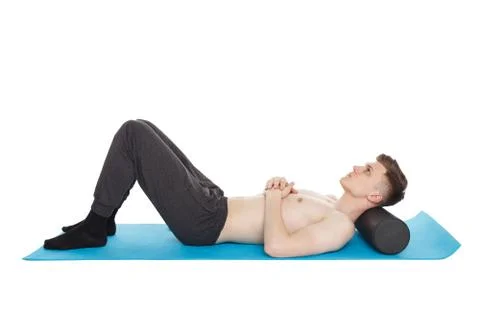 Handsome man shows exercises Фото