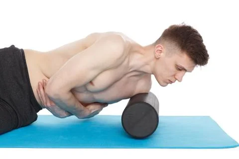 Handsome man shows exercises Fotos de archivo