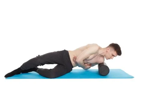 Handsome man shows exercises Fotos Stock