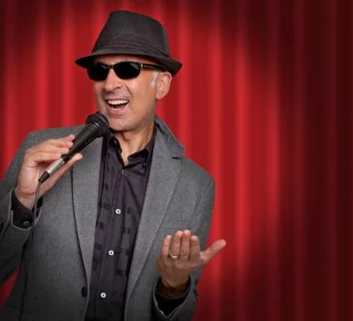 Handsome man singing Foto stock