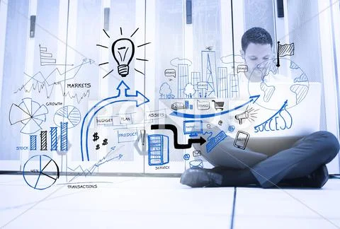 Handsome man sitting next to different sketches Stock Photos