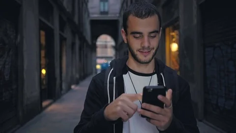 Handsome man with smartphone Stock Footage 81393184