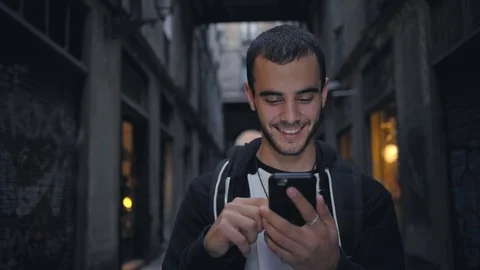 Handsome man with smartphone Stock Footage