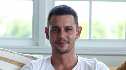 Handsome man smiling on camera. Stock Footage 163084735