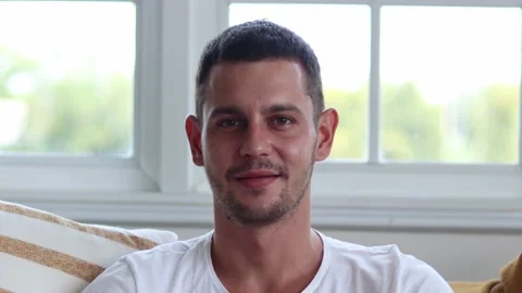 Handsome man smiling on camera. Stock Footage 163084737