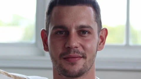 Handsome man smiling on camera. Stock Footage 163084786