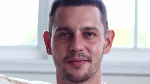 Handsome man smiling on camera. Stock Footage 163084814