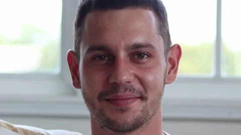 Handsome man smiling on camera. Stock Footage 163084842