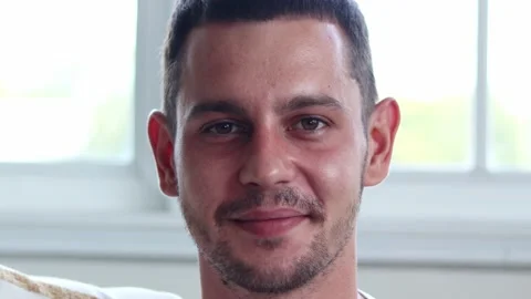 Handsome man smiling on camera. Stock Footage 163084849