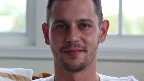 Handsome man smiling on camera. Stock Footage 163084858