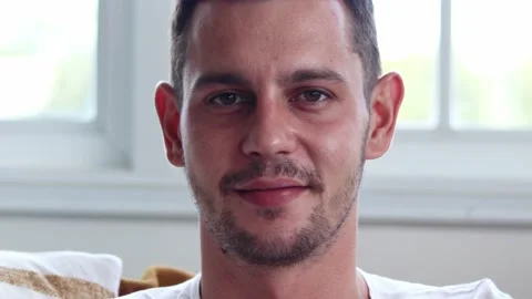 Handsome man smiling on camera. Stock Footage 163084866