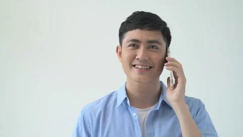 Handsome man speaking on his Mobile phone. Stock Footage 156175086