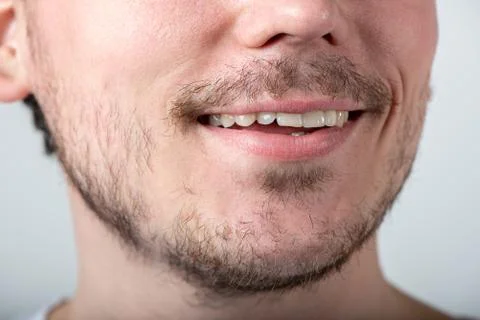 Handsome man with stubble or beard on face close up Stock Photos