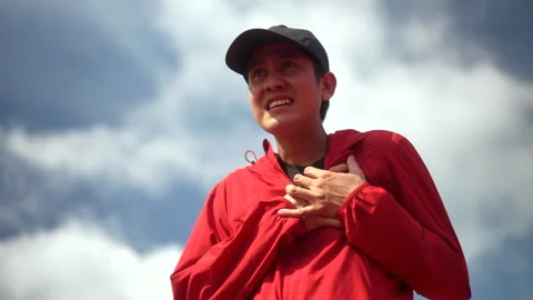 Handsome man tired during jogging and heart attack at sport stadium. Young asian Stock Footage 247428224