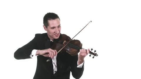 Handsome man in tuxedo performs fast composition on a classical violin. Isolated Stock Footage 134495415