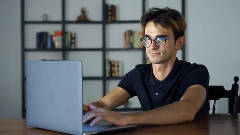 Handsome Man Typing on the Keybord, Using Laptop, Office Manager, Trider, Stock Stock Footage 93300890