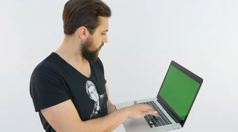 Handsome Man Typing on Laptop Stock Footage 66419460