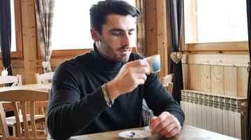 Handsome man using cellphone in cozy ski resort Stock Footage 85805111