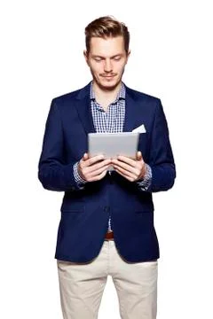 Handsome man using digital tablet Stock Photos