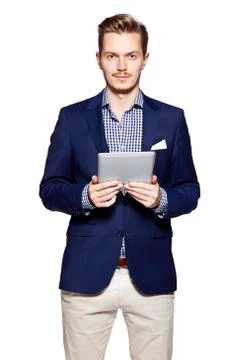 Handsome man using digital tablet Stock Photos
