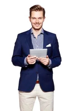 Handsome man using digital tablet Stock Photos