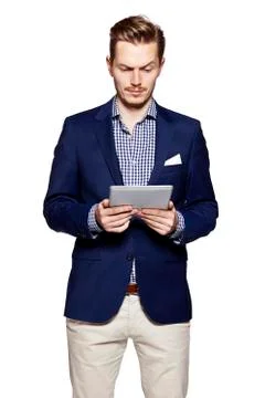 Handsome man using digital tablet Stock Photos