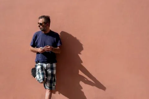 Handsome Man Using his Mobile Phone on a sunny day Stock Photos