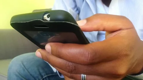 Handsome Man Using His Smartphone in Nairobi, Kenya Stock Footage