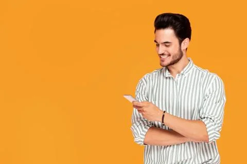 Handsome man using mobile phone. 스톡 사진