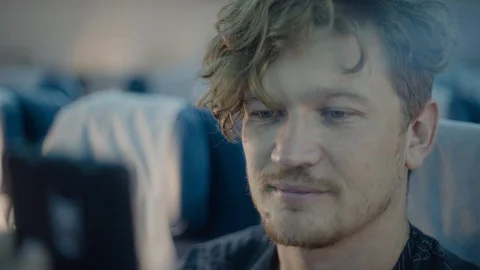 Handsome Man Using Smart Mobile Phone Searching Online Airplane Travel Stock Footage 94466036