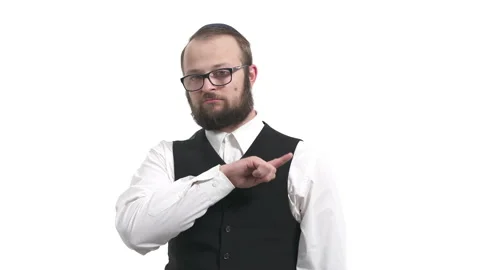 Handsome man wearing kippa touching his chest, pointing with finger to the Stock Footage 130183355