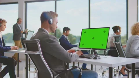 Handsome man working on computer 스톡 동영상 168275418