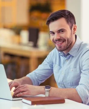 Handsome man working Stock Photos