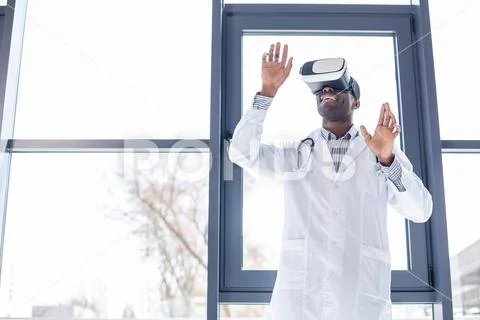 Handsome medical worker spending break with pleasure Stock Photos