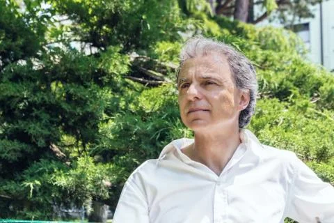 Handsome middle-aged man looking the horizon Stock Photos