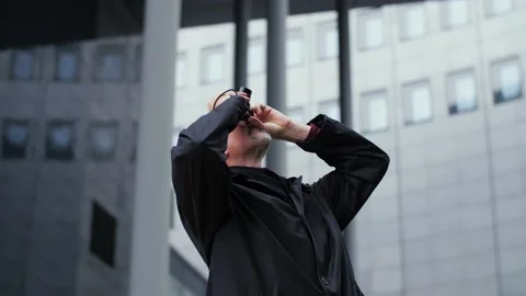 Handsome middle aged man taking pictures downtown in a city. Stock Footage 165206452