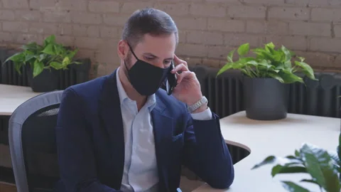 Handsome middle-eastern Man In Face Mask Office Workplace On Coronavirus Stock Footage 136544007