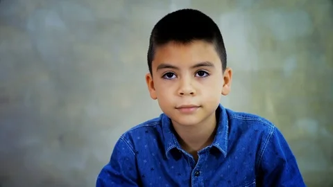 Handsome mixed race boy talks to camera Stock Footage 92196025
