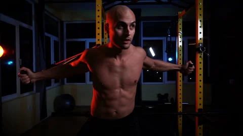 Handsome model young man training back in gym Stock Footage 151336864