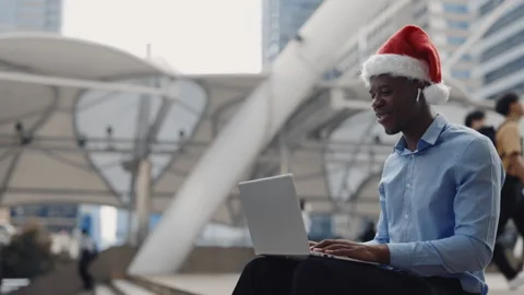 Handsome Multi-ethnic Man in Santa Claus Hat Conducts Online Conference, Online Stock Footage 305778066
