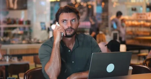 Handsome multitasking Hispanic bearded man, successful entrepreneur, copywriter Stock Footage 218565834