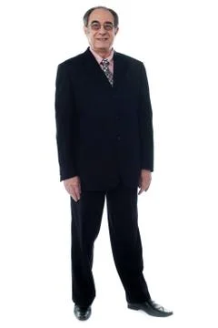 Handsome old man posing casually Stock Photos