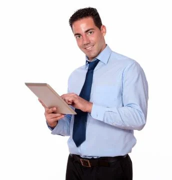 Handsome person using his tablet pc Stock Photos