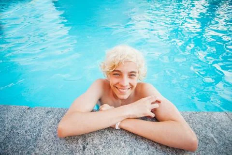 Handsome in the pool outdoor Stock Photos